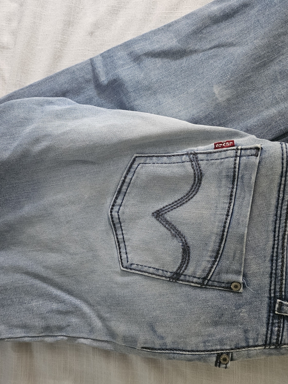 Levi's Light Blue Straight Leg Jeans with Signature Pocket Stitching